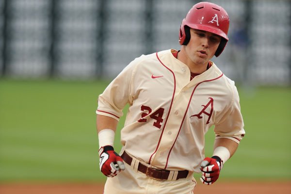 Arkansas right fielder Chad Spanberger rounds the bases against Creighton Tuesday, April 19, 2016, after hitting a two-run home run during the second inning at Baum Stadium in Fayetteville. Visit nwadg.com/photos to see more from the game.