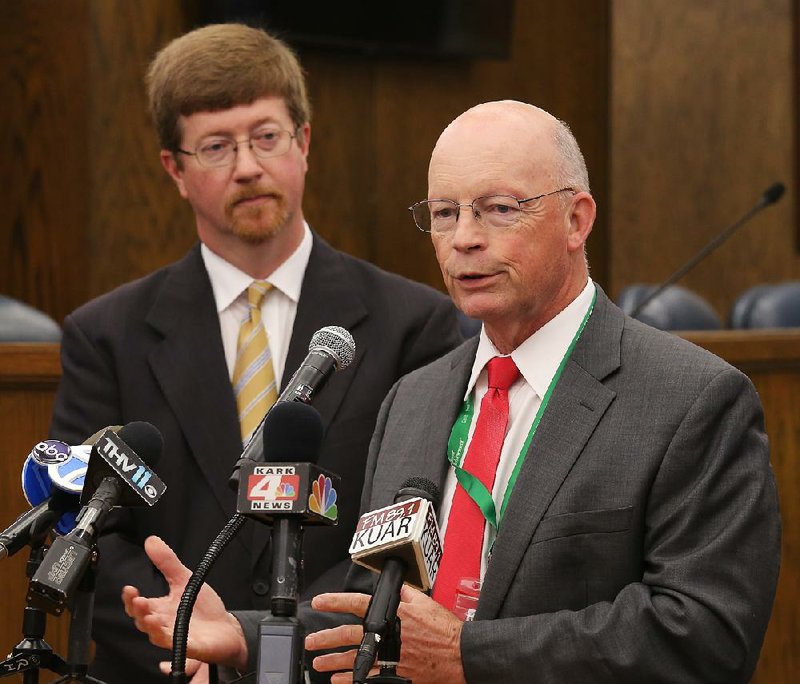 Baker Kurrus (right), superintendent for the Little Rock School District, and Johnny Key, Arkansas education commissioner, speak during a news conference about the leadership change in the state’s largest school district.