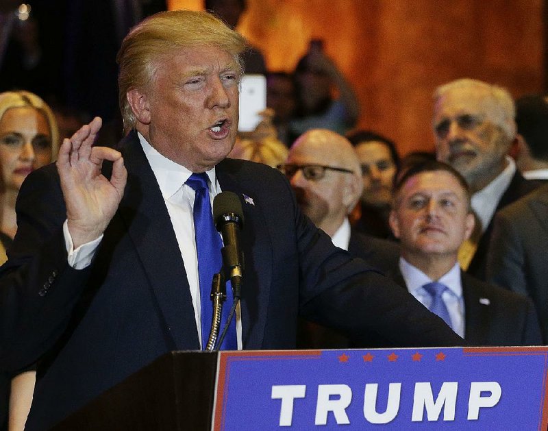 Republican presidential candidate Donald Trump addresses a crowd of supporters Tuesday evening in New York after winning the GOP primary.