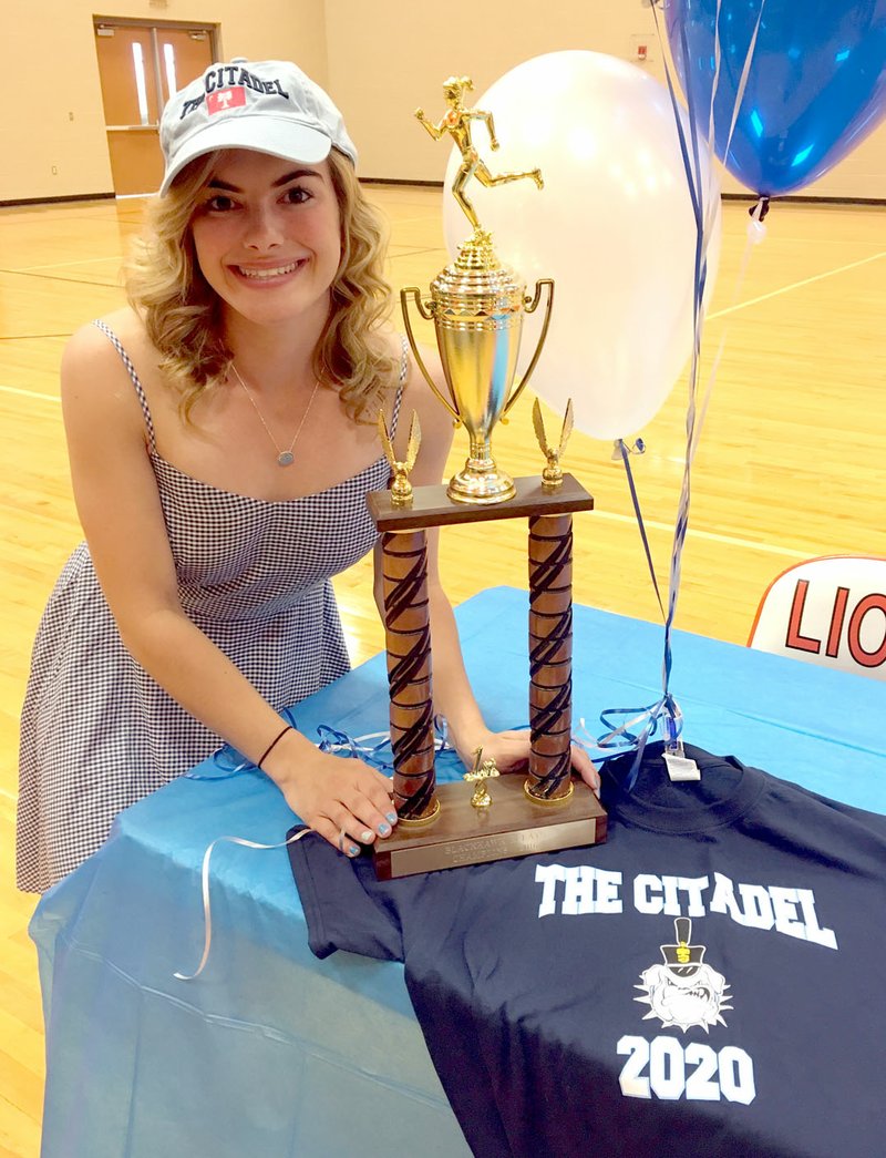 Submitted Photo Jordan Neeley, a student of Gravette High School, is planning on participating in Division One Track at The Citadel in South Carolina next year. She signed her national letter of intent in the Gravette High School Field House on April 13.
