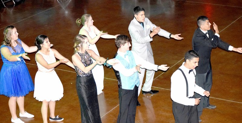 Photo by Mike Eckels When the music started, a few student began the line dance, the &#8220;Macarena,&#8221; during the 2016 Decatur High School prom held this year at the Horton Farms near Decatur April 15.
