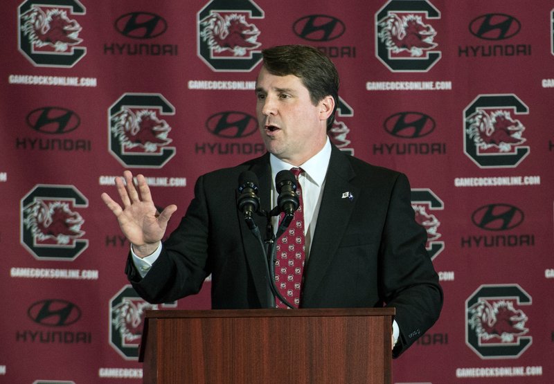 FILE - In this Dec. 7, 2015 file photo, New South Carolina head football coach Will Muschamp speaks with the media at Williams Brice Stadium in Columbia, S.C. The Southeastern Conference Eastern Divisions new look added more intrigue than usual to spring practice. Three of the divisions seven teams - Georgia, Missouri and South Carolina - are breaking in new head coaches. (AP Photo/Sean Rayford, File)