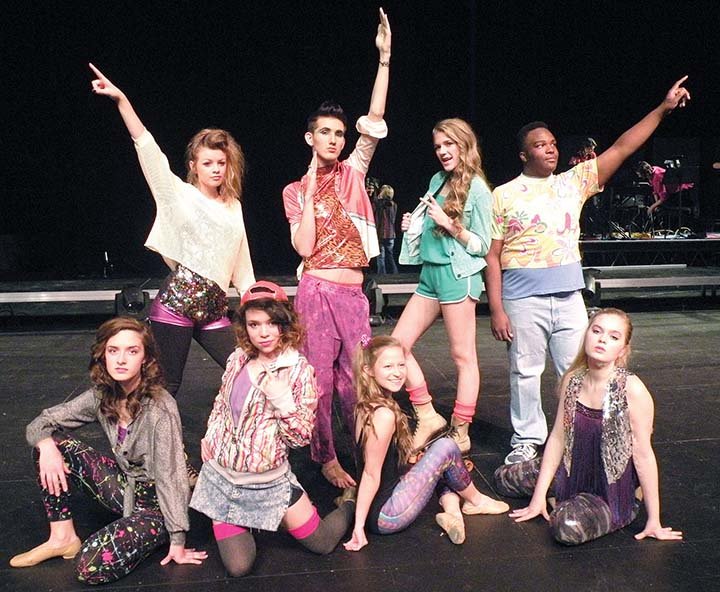 Wearing appropriate costumes from the 1980s movie version of Xanadu, are, front row, from left, Carolyn Etzel, Kirsten Cratty, Cameron Davis and Cailey Koch; and back row, Montgomery Dodge, Sedrick Pelkey, Annalee Drain and Addison Smith. The play premieres tonight at Russellville High School.