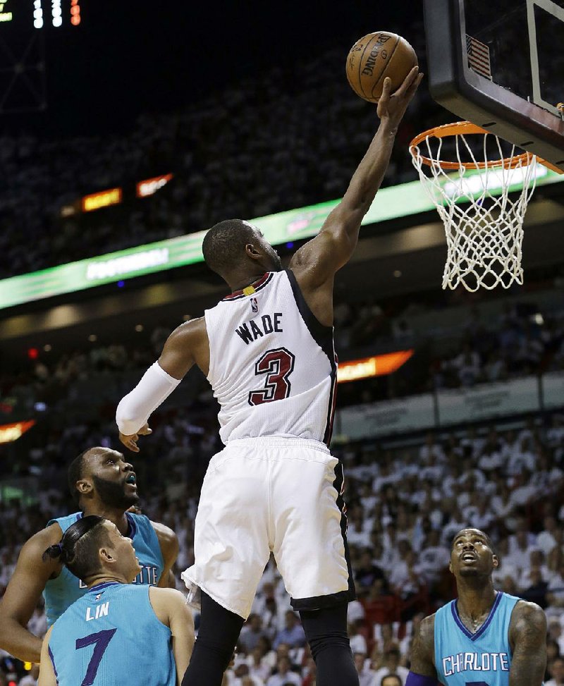 Miami guard Dwyane Wade scored 28 points Wednesday to lead the Heat to a 115-103 victory over the Charlotte Hornets in Miami. 