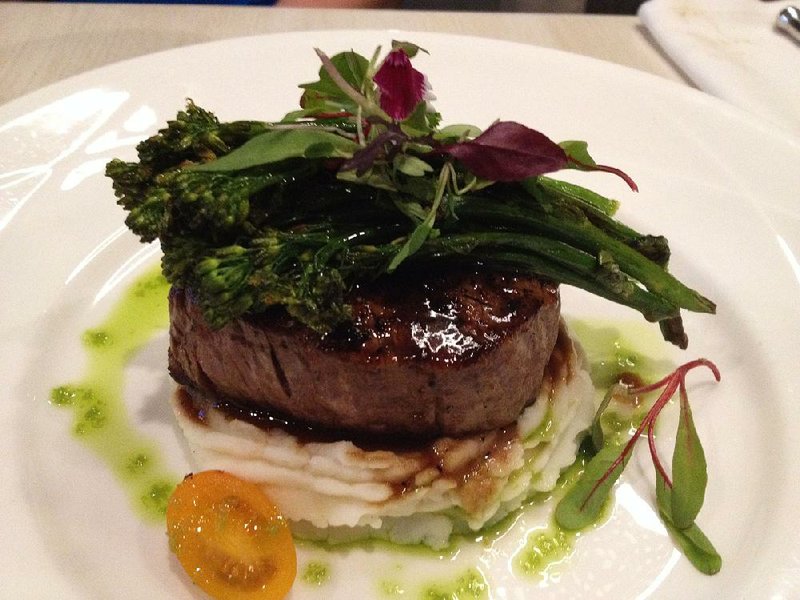 The Beef Loin Filet comes on a bed of pureed cauliflower with “asperation” at Table 28 in west Little Rock’s Burgundy Hotel. 