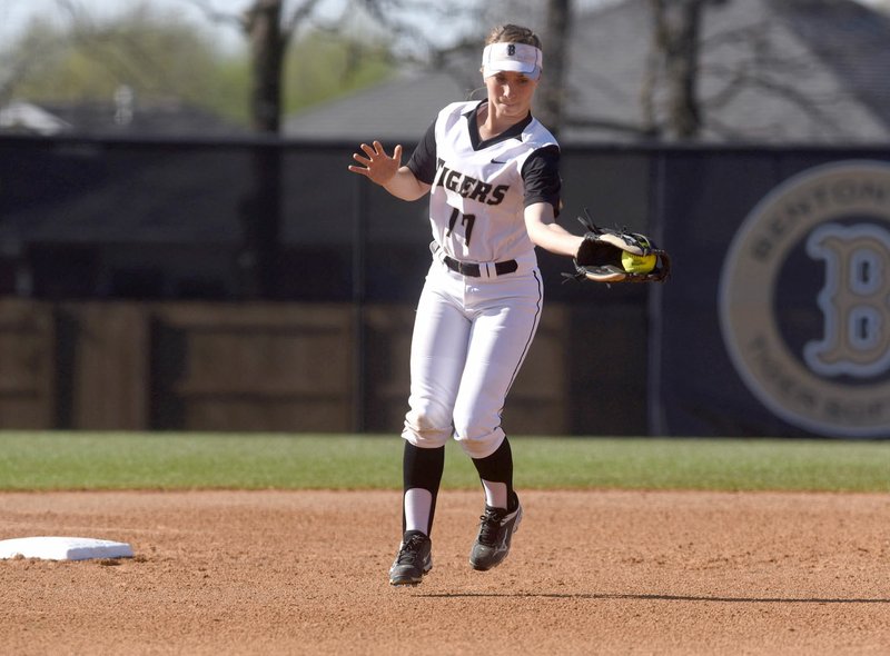 Bentonville's CJ Gonzalez fields a hit April 5 against Rogers.