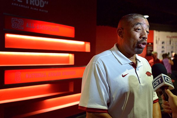 Arkansas linebackers coach Vernon Hargreaves talks to reporters during the team's media day Sunday, Aug. 9, 2015, at the Fred W. Smith Center in Fayetteville. 