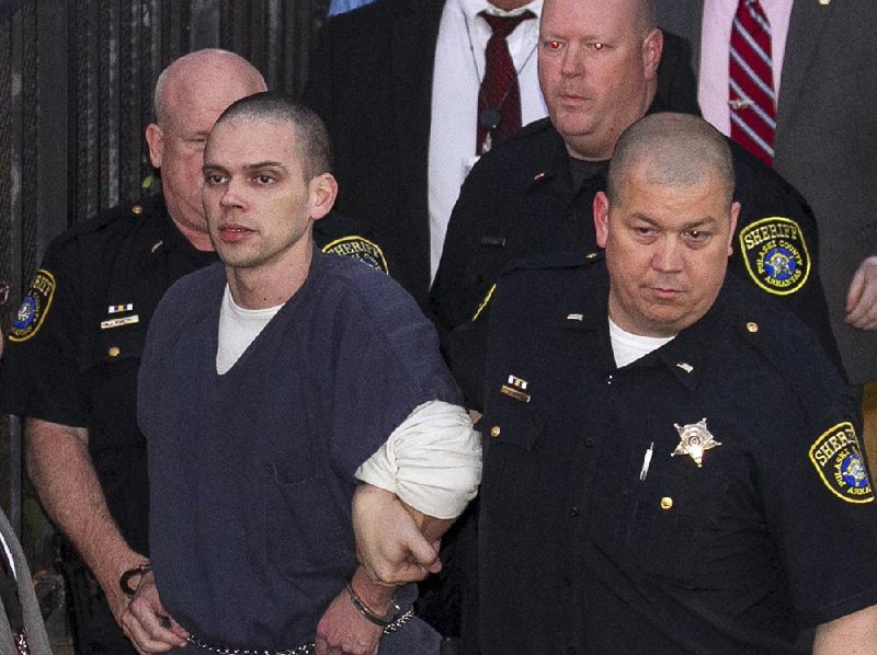 In this file photo Arron Lewis is escorted from the Pulaski County Courthouse after a jury found him guilty of kidnapping and murdering Beverly Carter. 