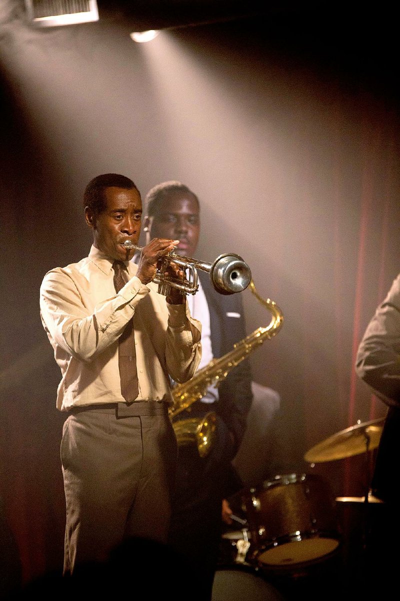 Don Cheadle stars as the legendary jazz musician Miles Davis in the bio-pic Miles Ahead, a film that Cheadle also directed.