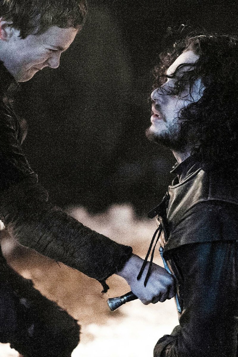 A tearful Olly (Brenock O’Connor) delivers the coup de grace to Jon Snow (Kit Harington) in the Season 5 finale of Game of Thrones. Snow is dead, but will he stay that way?

