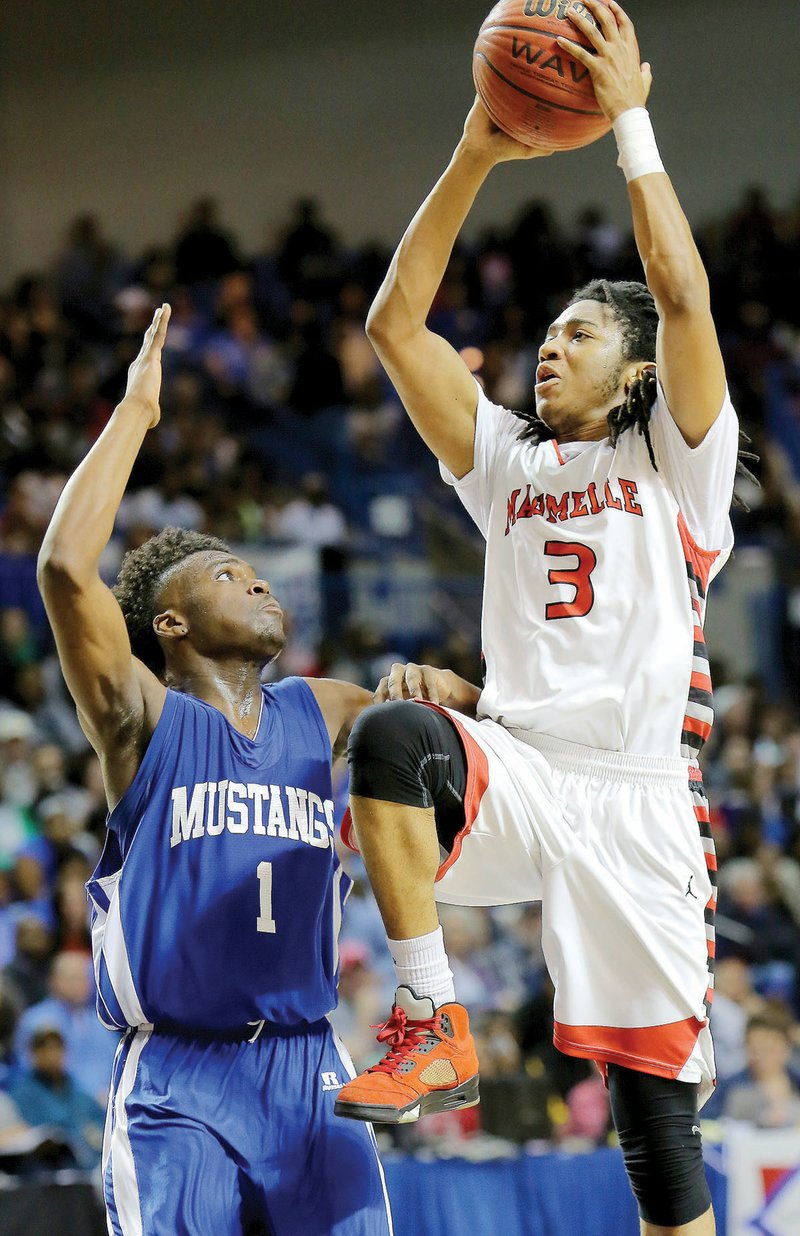 Maumelle’s  Shawn Williams, right, drives to the basket against Forrest City’s Robert Glasper during the Class 5A state championship game March 12 in Hot Springs. Williams is the 2016 River Valley & Ozark Edition Boys Player of the Year.