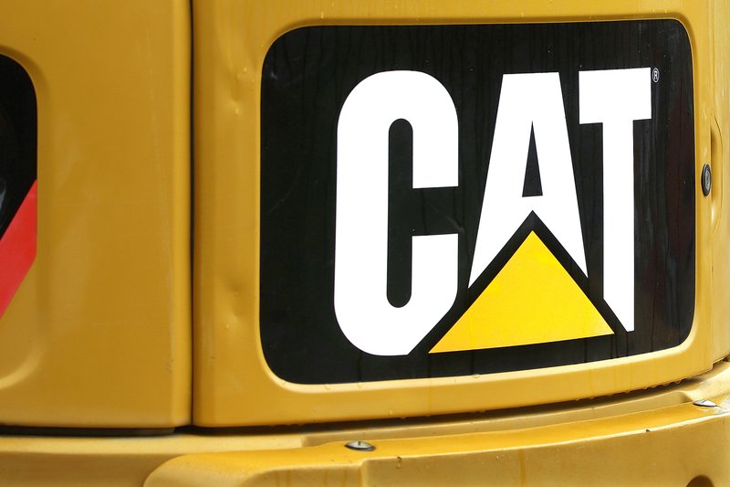 This June 10, 2014, file photo, shows the Caterpillar logo on heavy, earth-moving equipment in Springfield, Ill. Caterpillar Inc. reports financial results Friday, April 22, 2016. 