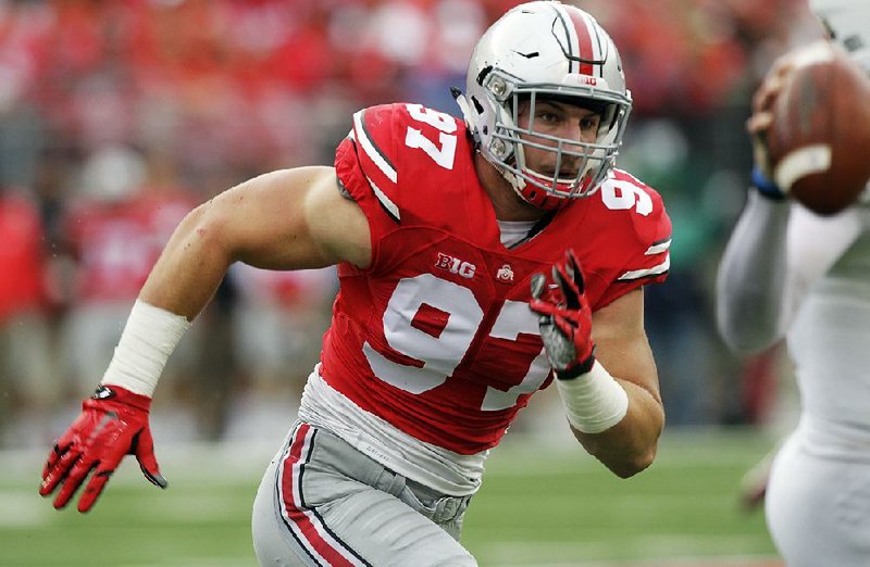 Former Ohio State defensive lineman Joey Bosa (above), along with fellow Buckeye Ezekiel Elliott, are two possible targets for the Dallas Cowboys, who are looking to shore up their pass rush in this week’s NFL Draft. 