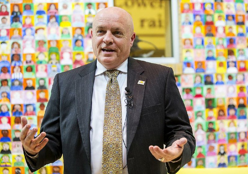 Michael Poore addresses his resignation as superintendent of Bentonville Schools on Tuesday, April 19, 2016, inside Mary Mae Jones Elementary School in Bentonville. Poore has accepted the same position in Little Rock.