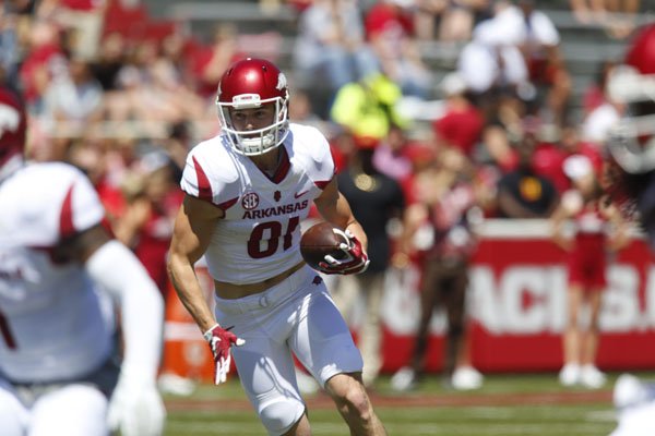 Arkansas wide receiver Cody Hollister runs with the ball during the Razorbacks' annual Red-White spring game on Saturday, April 24, 2016, at Razorback Stadium in Fayetteville.