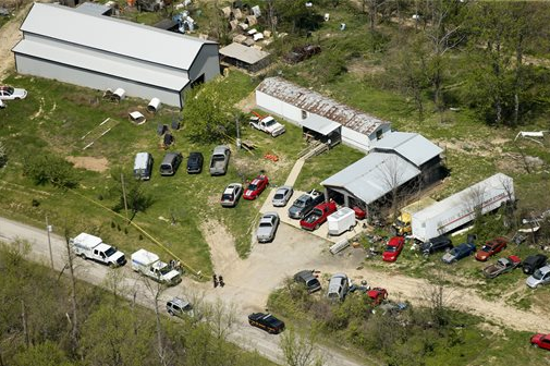 This aerial photo shows one of the locations being investigated in Pike County, Ohio, as part of an ongoing homicide investigation. Several people were found dead Friday, April 22, 2016, at multiple crime scenes in rural Ohio.