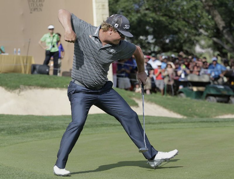 Charley Hoffman celebrates after sinking a birdie putt on the 18th hole to win the Texas Open on Sunday in San Antonio. Hoffman closed with a final round 3-under 69 to hold off Patrick Reed and Chad Collins to pick up his fourth PGA Tour victory.