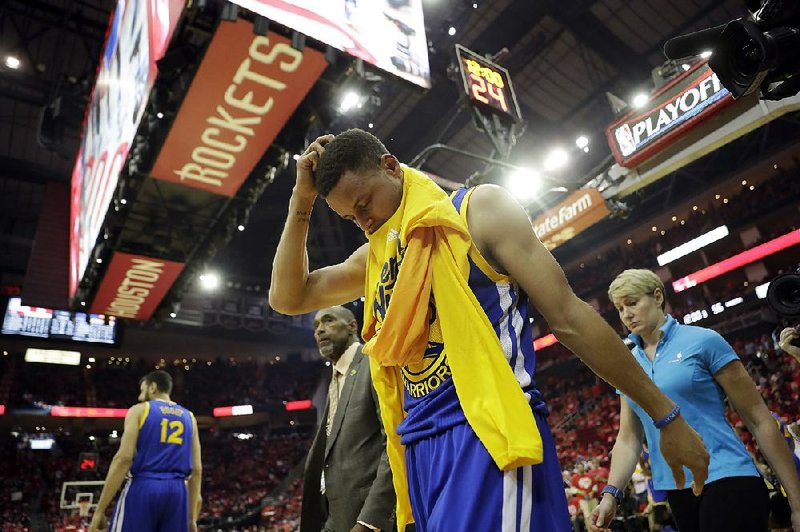 Golden State guard Stephen Curry will miss at least two weeks after suffering a Grade I medial collateral ligament sprain in his right knee during Sunday’s NBA playoff game against Houston. The Warriors can wrap up their series with a victory in Game 5 on Wednesday.