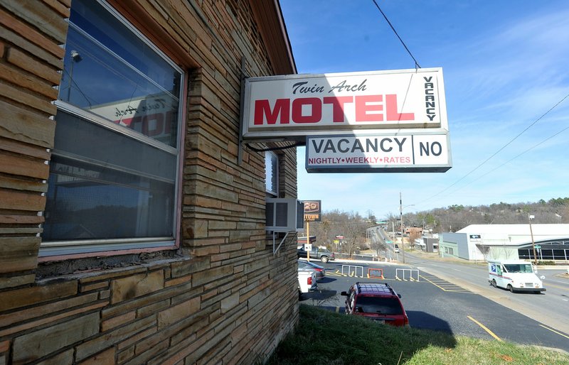 The Twin Arch Motel on College Avenue in Fayetteville. Under the plan before the Planning Commission on Monday, the 1950s-era building near downtown would be replaced by a U-shaped cluster of 14 furnished studio apartments around a central courtyard with trees and grass.