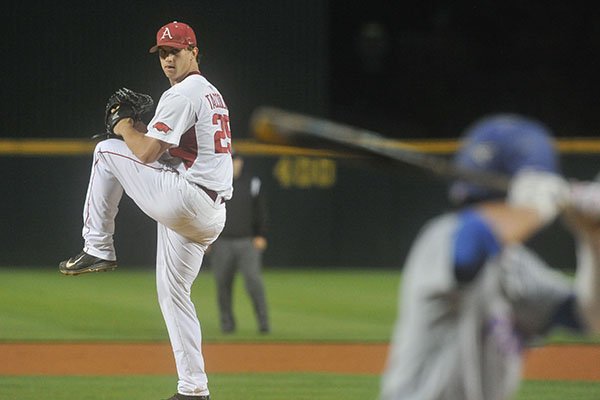 Arkansas pitcher Dominic Taccolini winds up during a game against Florida on Thursday, April 14, 2016, at Baum Stadium in Fayetteville. 