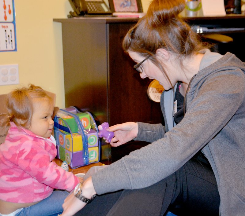 JANELLE JESSEN ENTERPRISE-LEADER Occupational therapist Mallory Causey worked with Lily, a young student at Kids Unlimited Learning Academy in Farmington.