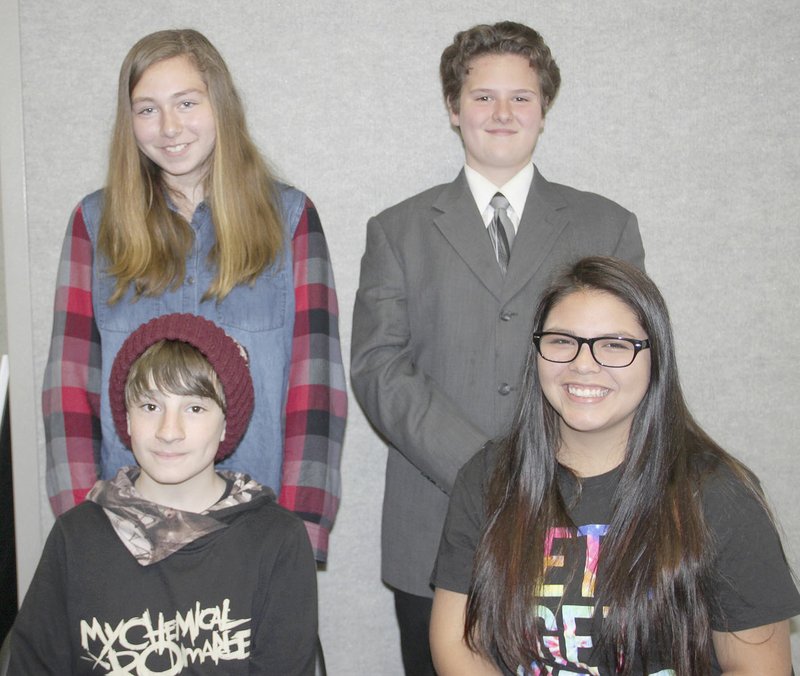 LYNN KUTTER ENTERPRISE-LEADER These Lincoln students are volunteers in the community garden. They shared information about the garden recently with the Farmington Garden Club. Those who spoke were Rosa Hernandez, Zaki Allouh, Jordan Montgomery and David Embrey.