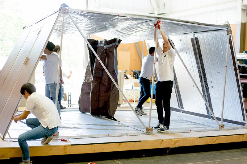 Photo submitted Team members from Gyeongsang National University constructed their shelter design on the shake table for the earthquake simulation.