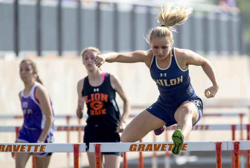 Alyssa Antuna, Shiloh Chrisitan senior, competes in the 100-meter hurdles on Tuesday, April 26, 2016, during the 4A-1 conference track meet at Gravette High School. See more photos at nwadg.com/photos.