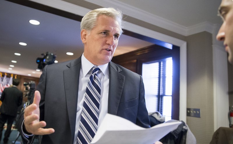 In this Dec. 8, 2015 file photo, House Majority Leader Kevin McCarthy of Calif. speaks with a reporter on Capitol Hill in Washington.