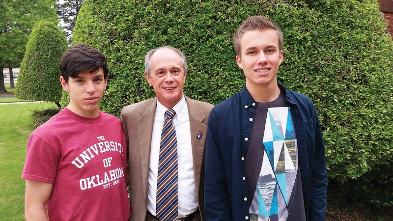 After years of encouragement to become a host parent for an exchange student, Jacksonville Mayor Gary Fletcher, center, agreed to host two 16-year-old boys: Pablo Yusteramos, left, of Spain and Benjamen Schelpers, right, of Germany. Fletcher said he wishes he would have said yes to the opportunity earlier.