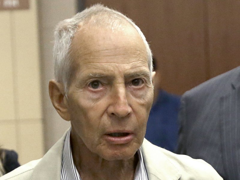 FILE - In this Aug. 15, 2014 file photo, New York City real estate heir Robert Durst leaves a Houston courtroom. New Orleans Federal Judge Kurt Engelhardt on Wednesday, April 27, 2016, approved a plea agreement for Durst to serve 7 years, 1 month in prison on a weapons charge. Durst still faces a separate murder charge in California. (AP Photo/Pat Sullivan, File)
