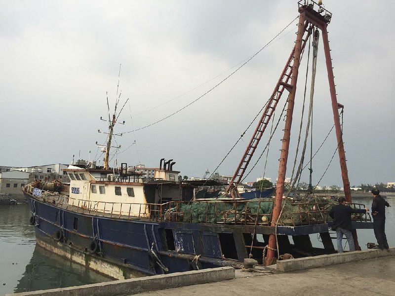 A Chinese fishing vessel sits in dock in Beihai, China, after it was recovered last month by the Chinese coast guard after its seizure by Indonesia, which added to tensions in the South China Sea. 