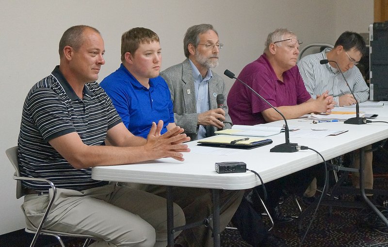 RITA GREENE MCDONALD COUNTY PRESS Missouri Department of Natural Resources panel addressing questions at the public meeting regarding the Roger Renner proposed chicken factory in the Goodman area Monday, April 25. Left to right: Brooks McNeill and Gorden Wray, Environmental Specialists; John Madras, Water Protection Program Director; Greg Caldwell, Environmental Specialist III and Jake Faulkner, Unit Chief, Industrial Permits.