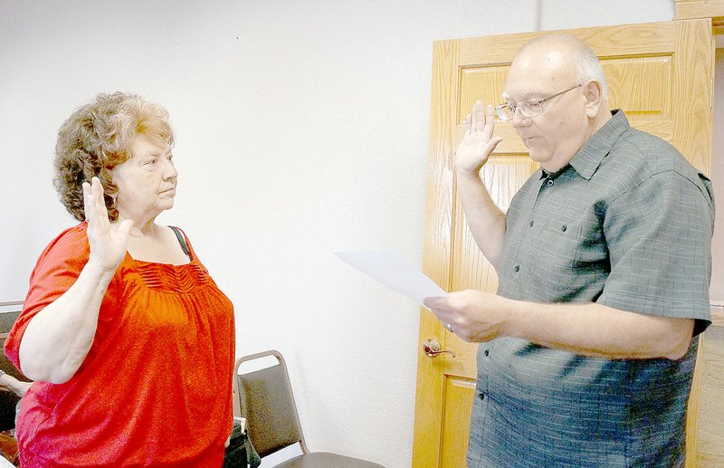 RITA GREENE MCDONALD COUNTY PRESS Linda Schlessman was appointed to the Housing Board and sworn in by Mayor Gregg Sweeten at the Pineville city council meeting Tuesday.