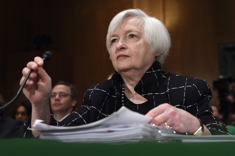  In this Thursday, Feb. 11, 2016, file photo, Federal Reserve Board Chair Janet Yellen prepares to testify on Capitol Hill in Washington, before the Senate Banking Committee hearing on: "The Semiannual Monetary Policy Report to the Congress"