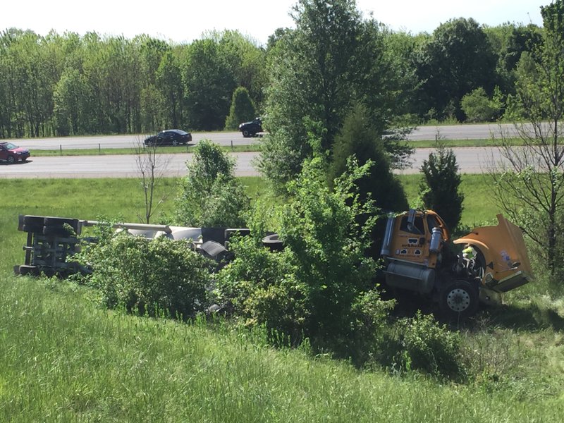 A semitrailer rolled off the exit ramp at Exit 66 on I-49 in Fayetteville.