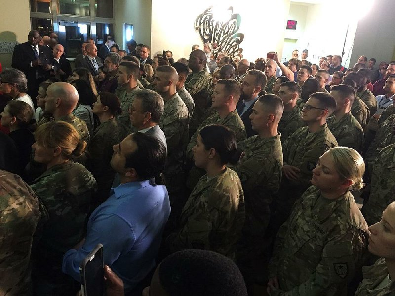 U.S. soldiers serving in Iraq get a greeting from Vice President Joe Biden on Thursday at the U.S. Embassy in Baghdad.