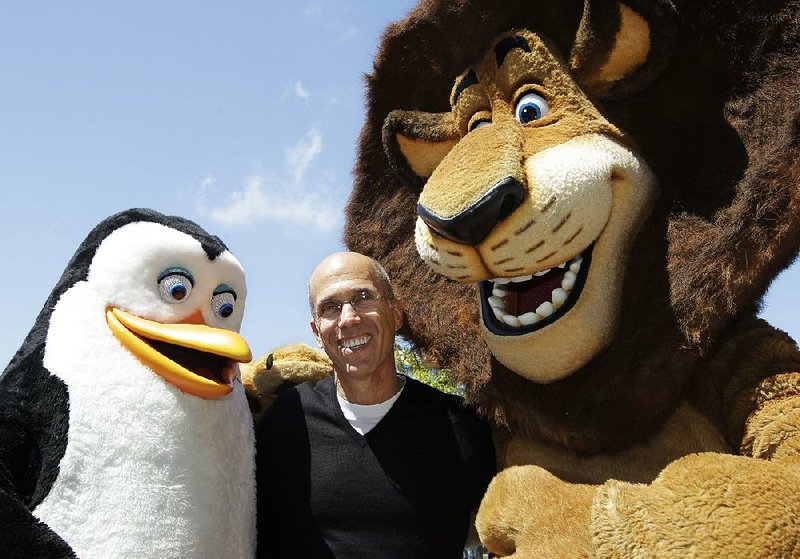 DreamWorks Animation CEO Jeffrey Katzenberg plays with Madagascar characters Alex the lion and Kowalski the penguin at a groundbreaking ceremony for DreamWorks studios in Redwood City, Calif., in 2012.