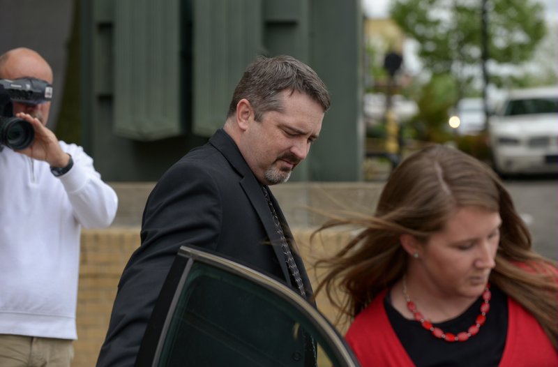 Former Benton County Sheriff Kelley Cradduck leaving court Friday after pleading no contest to a misdemeanor.