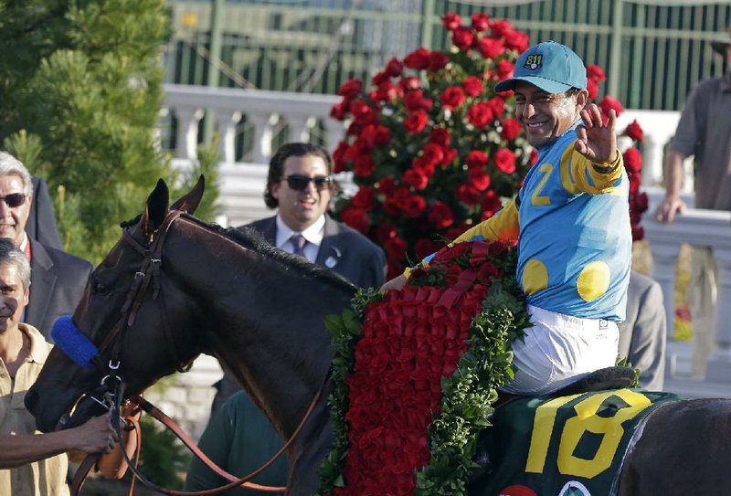 Victor Espinoza sits atop American Pharoah after last year’s Kentucky Derby, the first leg of the first Triple Crown in more than a generation (1977). Presbyterian Village development director Melissa Jenkins says the Derby has become a big watch event — and for her an opportunity to raise funds for a new digital wireless nurse call system at the Village. 