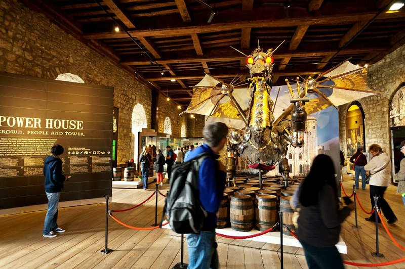 The Tower of London’s dragon, made of old weaponry, thrills visitors young and old. 