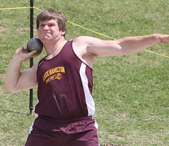 The Sentinel-Record/Richard Rasmussen ELI’S COMING: Lake Hamilton senior Eli Jackson, pictured in action last season, breaks his school record in the shot put with a winning heave of 58 feet, 8 inches Thursday at the Class 6A-South meet in Texarkana. Jackson defends the Class 6A state title next week in Benton.