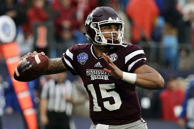 Former Mississippi State quarterback Dak Prescott was drafted in the fourth round by Dallas on Saturday and is expected to compete for a spot on the team’s 53-man roster. 