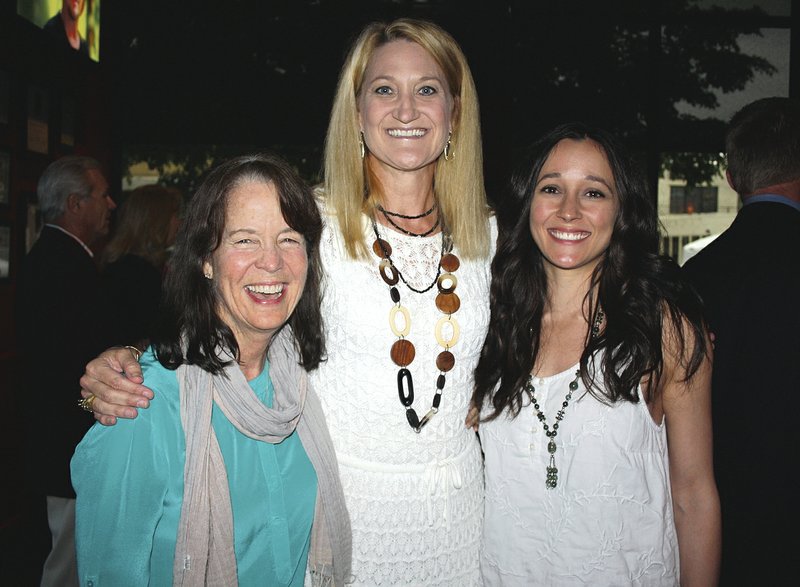 Jean Ann Fennel (from left), Michelle Fyfe and Mary Fennel visit at the Restore Humanity wine dinner.