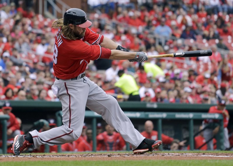 Washington Nationals' Jayson Werth follows through an a three-run home run during the first inning of a baseball game against the St. Louis Cardinals Saturday, April 30, 2016, in St. Louis. 