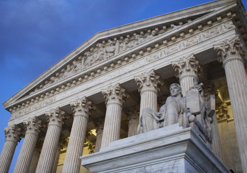 In this Feb. 13, 2016 file photo, the Supreme Court building at sunset in Washington.