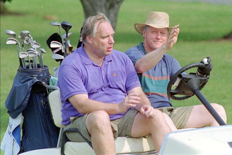 Former Arkansas Supreme Court Chief Justice and U.S. Justice Department official Webb Hubbell (left) — seen here golfing with President Bill Clinton on July 2, 1994 — will speak at the 8th Circuit Judicial Conference in Rogers this week. 