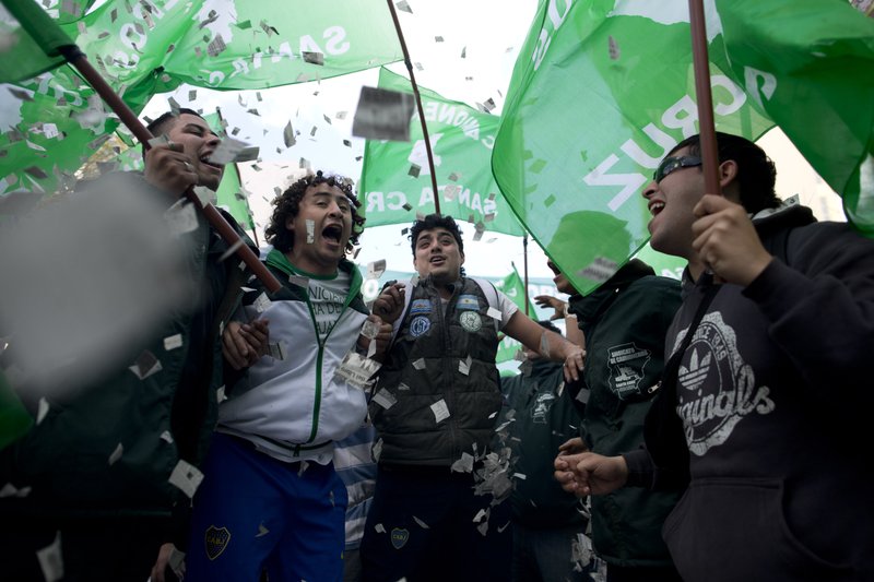 Workers protest skyrocketing consumer prices and job cuts Friday in Buenos Aires. Thousands of state employees have been fired since Argentina’s President Mauricio Macri came to power in December with promises to cut spending. 
