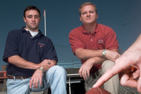 Arkansas Razorback kicker Tony Dodson (left) and former kicker Bruce Lahay.