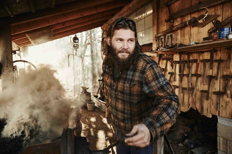 Daniel Casey, a blacksmith in Romance, stars in the History Channel show Iron & Fire.